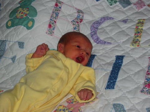 Janie on a quilt